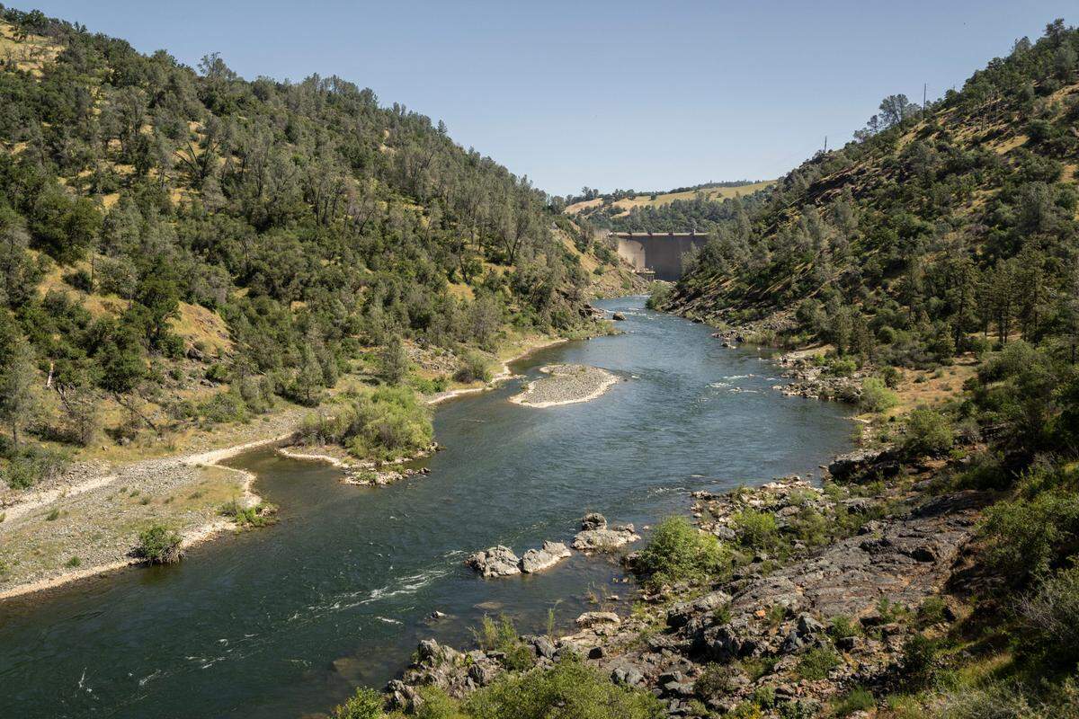 The Yuba River flows south of the Englebright Dam on Thursday, May 8, 2025. A “fishway” that is proposed at a smaller dam 10 miles downstream would allow more salmon to return to the area to spawn, but could also give predatory fish increased access. 