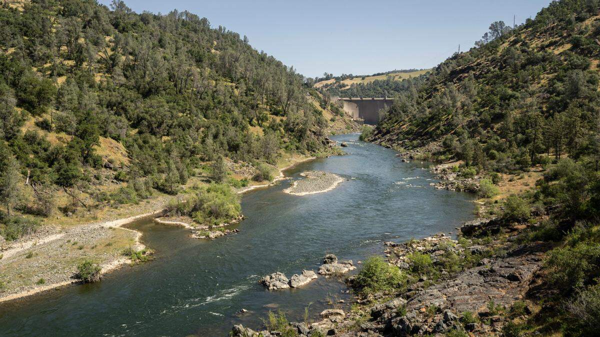 The Yuba River flows south of the Englebright Dam on Thursday, May 8, 2025. A “fishway” that is proposed at a smaller dam 10 miles downstream would allow more salmon to return to the area to spawn, but could also give predatory fish increased access. 