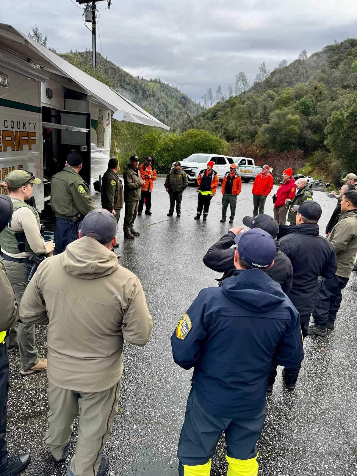 Search personnel gather before beginning operations on Monday in  Auburn State Recreation Area near Colfax. Authorities are continuing to search for 40-year-old Eryn VanAcker, who has been missing since Friday and is believed to have been swept into the American River.