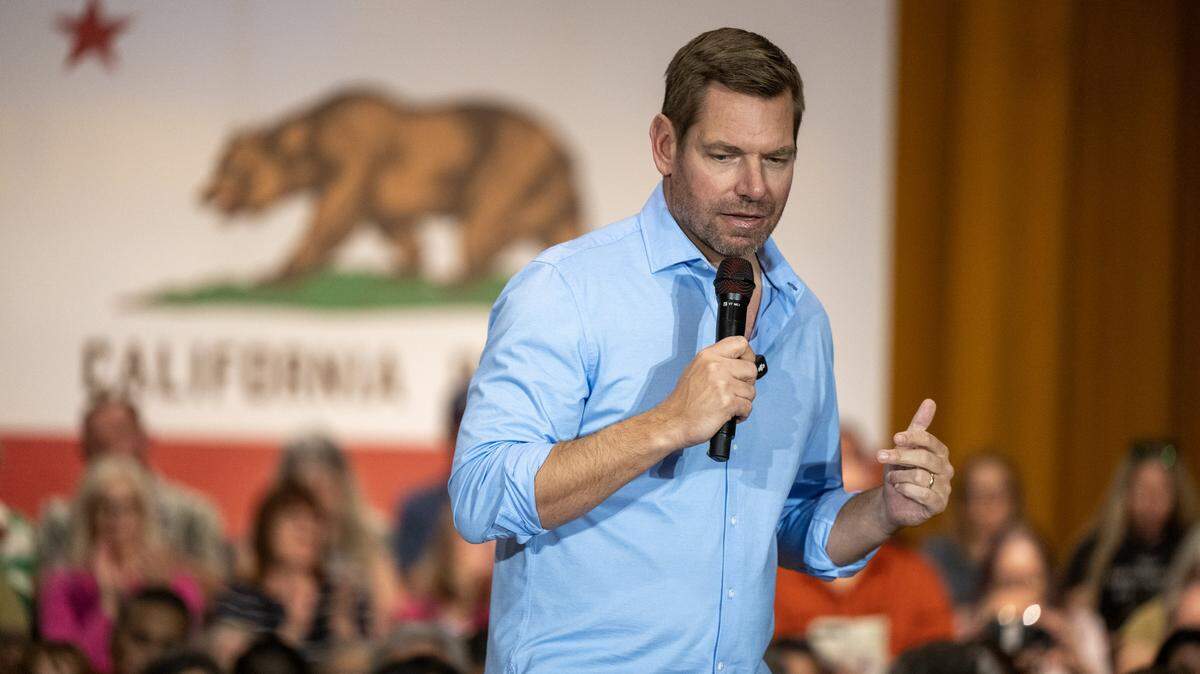 Rep. Eric Swalwell addresses a town hall audience at the Scottish Rite Masonic Center in Sacramento on Tuesday.