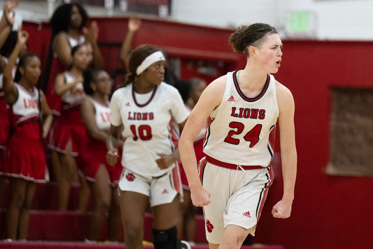 The McClatchy Lions’ Daisy Throckmorton (24) reacts after a Lions basket against the Antelope Titans last season.