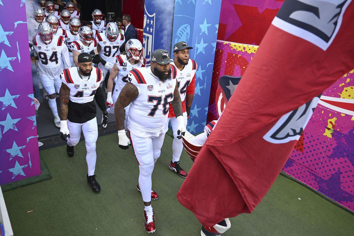 The New England Patriots enter the field before the start of Super Bowl LX at Levi’s Stadium in Santa Clara on Sunday, Feb. 8, 2026.