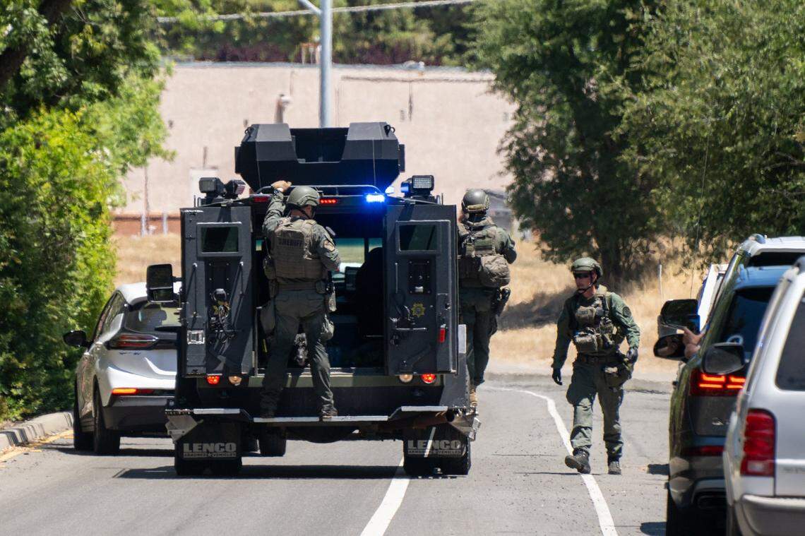 Police officers leave Zion Court in Rocklin after murder suspect Eric James Abril was captured behind the property on Monday, July 10, 2023, a day after he escaped custody from a Roseville hospital.