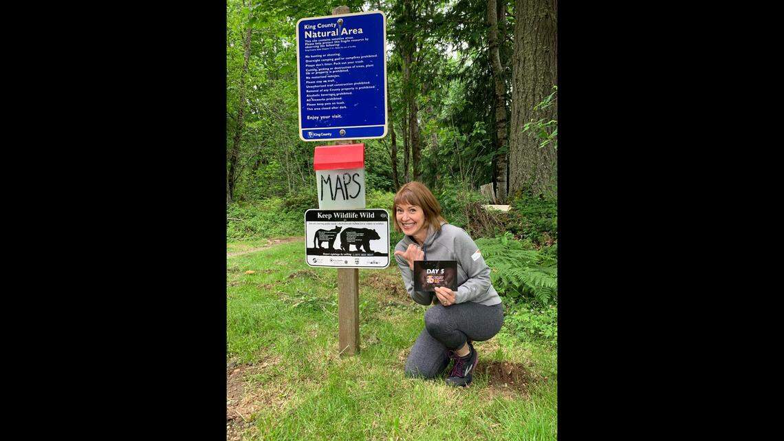 Kara Stender, 55, poses for a photo at the entrance of Soaring Eagle Regional Park in Washington. Stender said she was recently attacked by an owl during her four-mile run through the park. Photo from Kara Stender