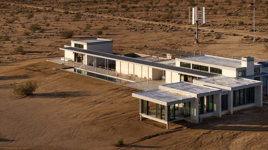 The Saturn Haus, a sophisticated desert masterpiece that serves as a modernist sanctuary in Joshua Tree, California, is listed for $14.99 million.