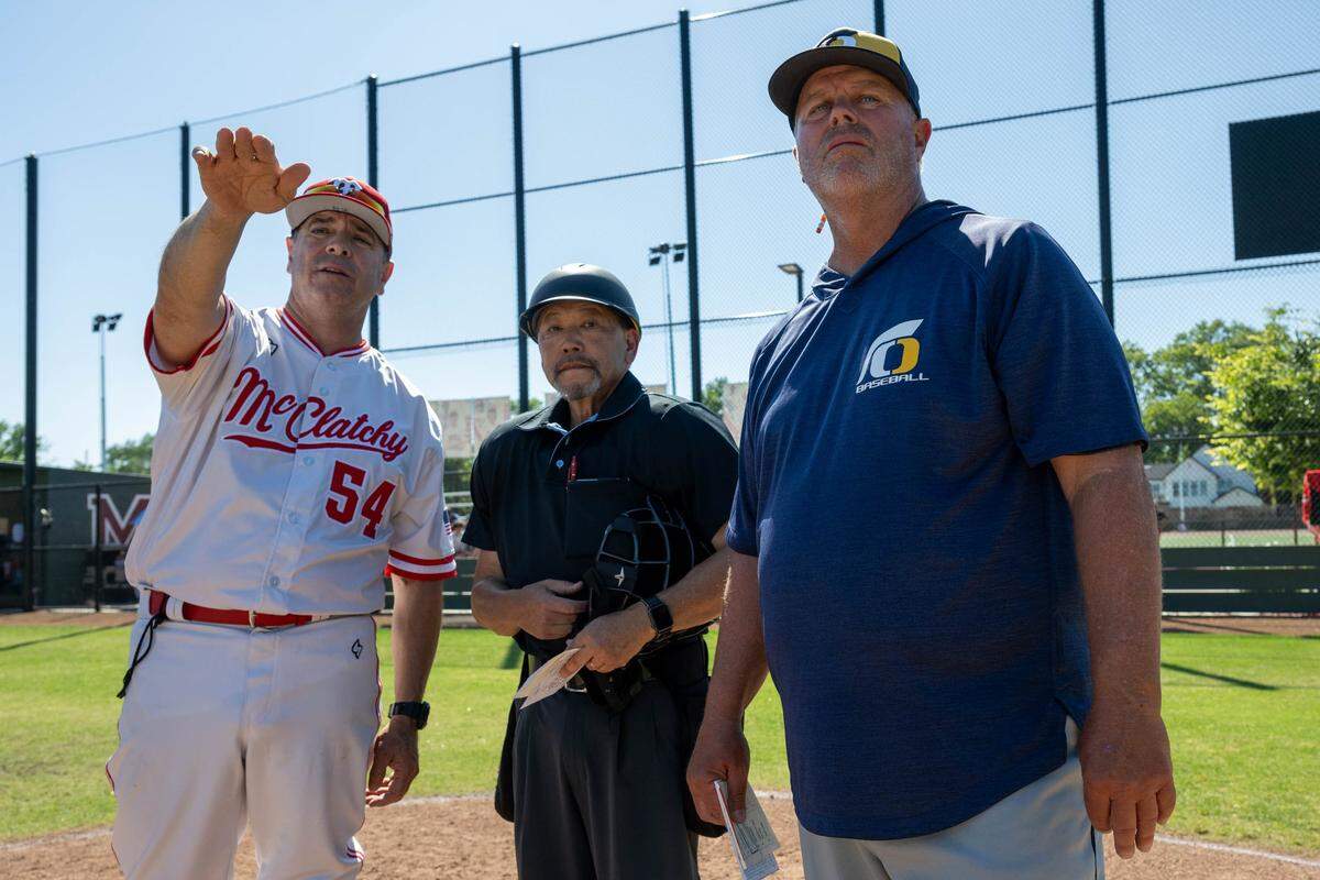 McClatchy coach Mike de Necochea explains the field rules with Oak Ridge coach Todd Melton before the CIF Sac-Joaquin Section Division I baseball playoff game at McClatchy High School on Friday in Sacramento.