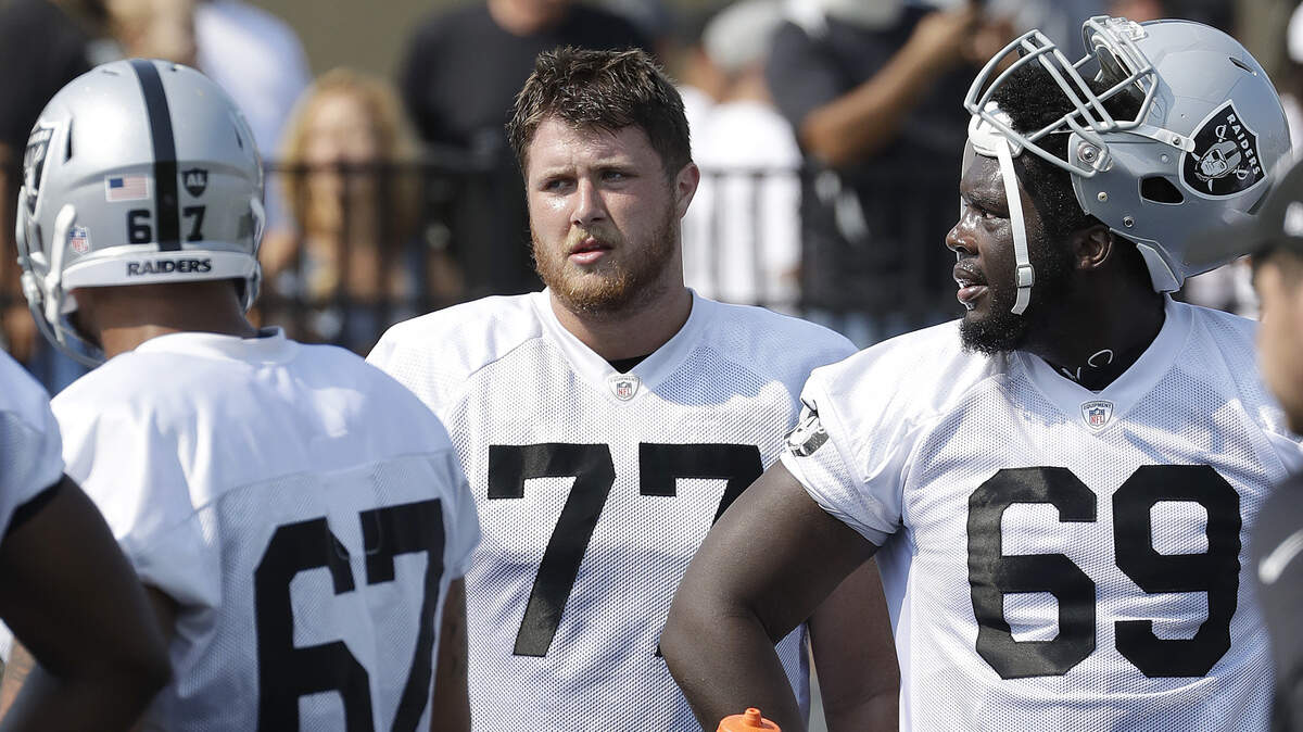 Raiders offensive lineman Kolton Miller, center, is seen at training camp in Napa on July 28. The Roseville High product was selected 15th overall in April’s NFL draft.