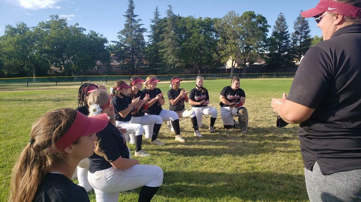The Laguna Creek softball team talks about a win over McClatchy after the game Thursday.