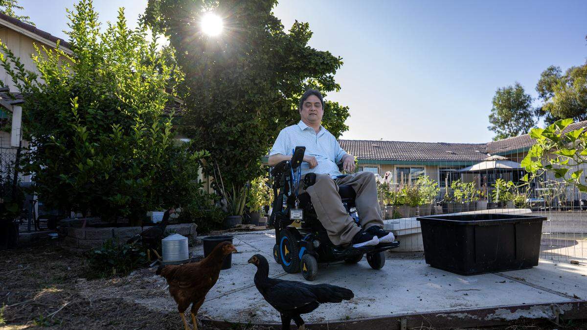 Alfonso Nguyen, who is part of a lawsuit claiming SMUD illegally shared energy usage data with law enforcement, at his home near Elk Grove earlier this month. Nguyen has an electric wheelchair that needs regular charging and is a heavy user of home heating and cooling systems because his body has difficulty regulating its temperature due to a disability. He has been visited twice by sheriff's deputies for his energy use.  