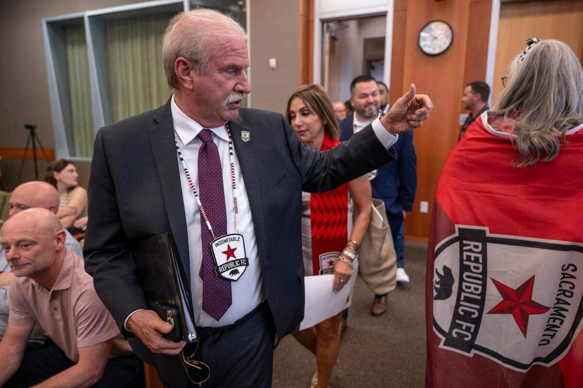 Kevin Nagle, Republic FC’s chairman and CEO, enters the city council chambers before a meeting on Tuesday to vote on two resolutions that would allow construction of a Railyards soccer stadium.