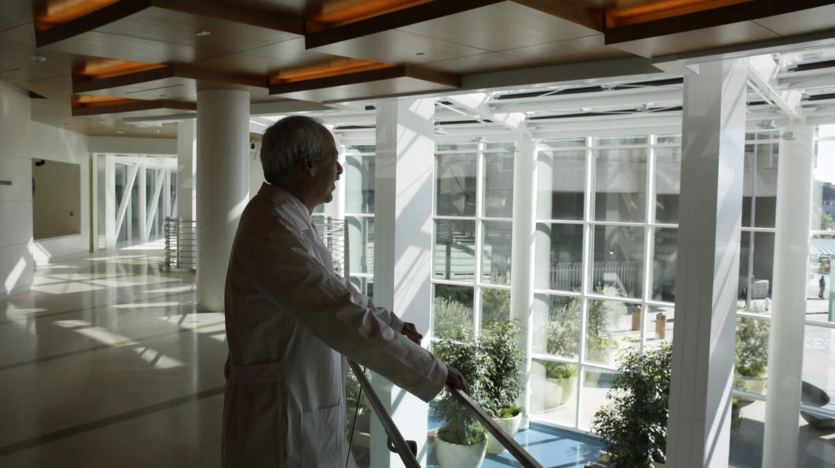 Chief of staff Dr. Jim Marks looks over the new lobby of the Priscilla Chan and Mark Zuckerberg San Francisco General Hospital and Trauma Center in 2015. Some nurses at the facility are lobbying to restore the original name of the hospital, citing privacy fears by patients.