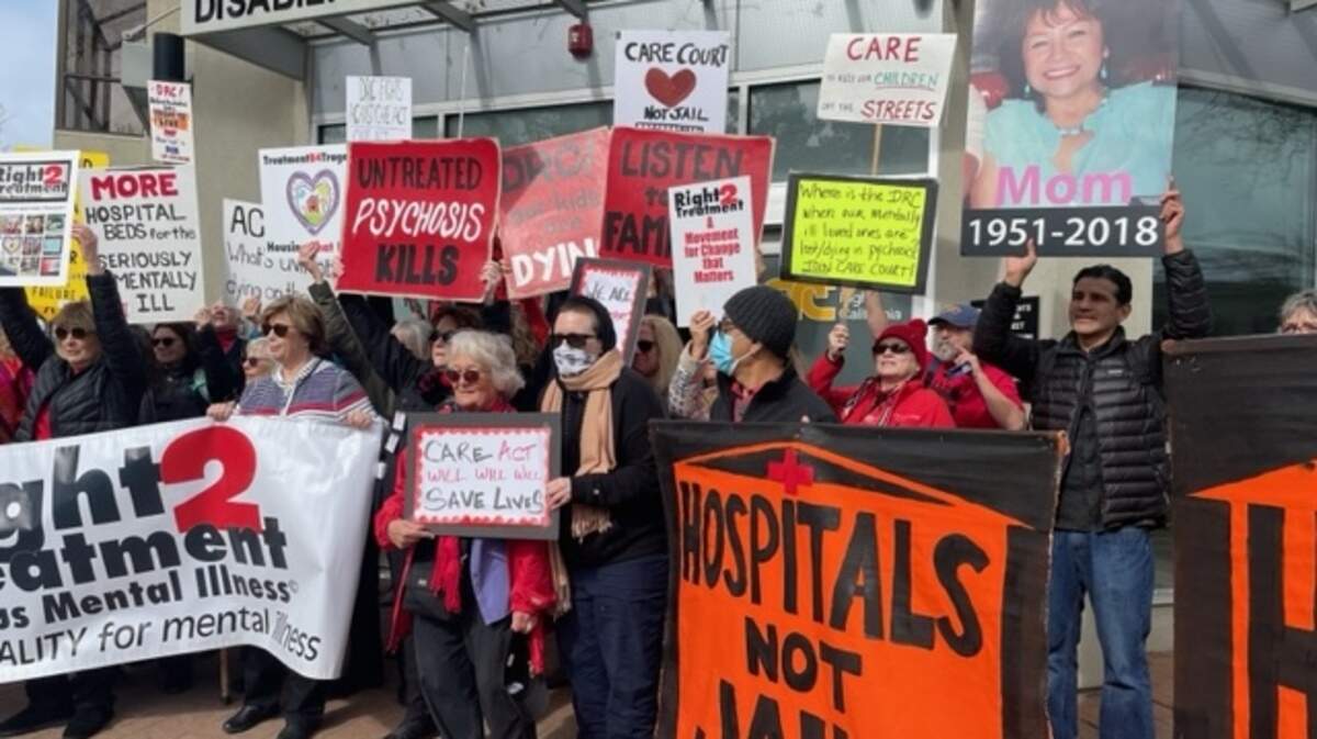 Family members of seriously mentally ill Californians rally Tuesday outside the K Street office of Disability Rights America.