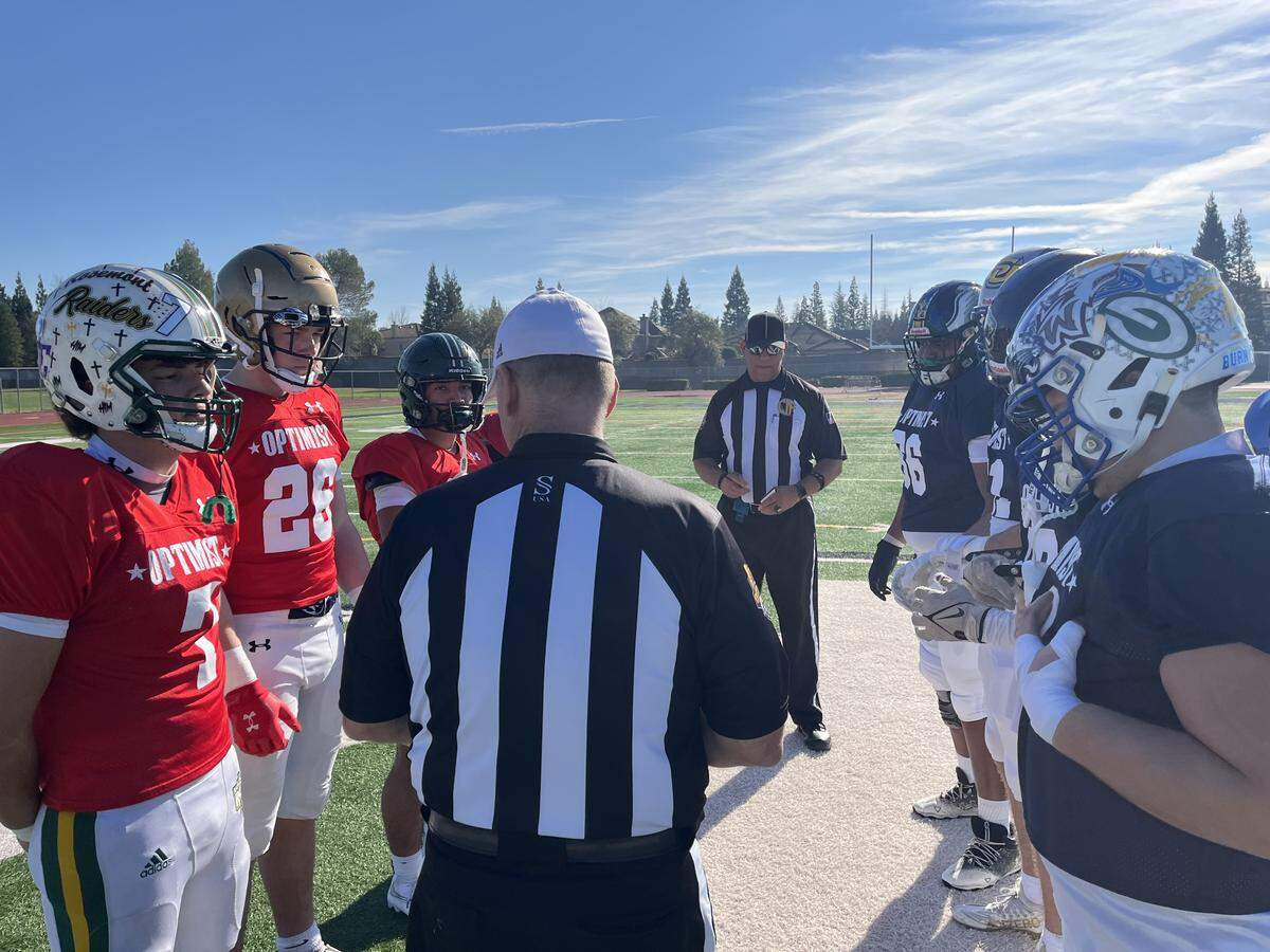 Team captains for the North and South prepare for kickoff for the 66th Optimist All-Star Football Classic on Saturday at Granite Bay High School. The South won 30-17 behind Jack Cromwell’s three touchdown runs.