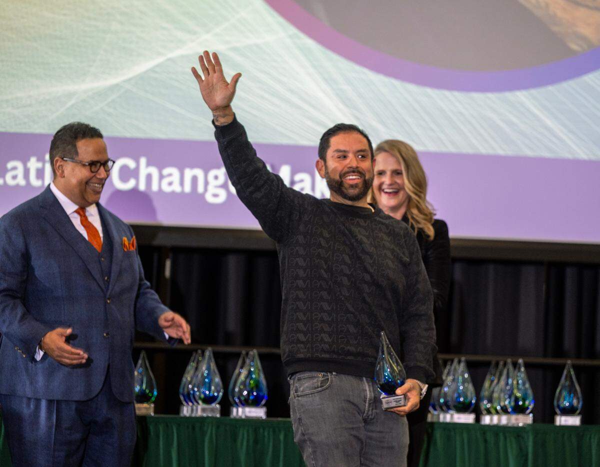 Change Maker Lisandro Madrigal, CEO and founder of Chando’s Tacos, acknowledges the applause from the crowd during the Change Makers Celebration 2025 on Friday at Sacramento State.