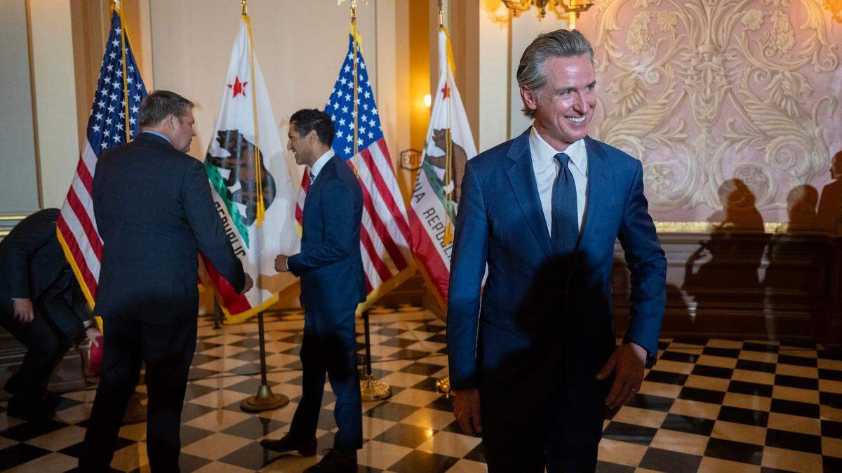Gov. Gavin Newsom holds a bill signing event for AB x2-1, which is intended to minimize gas price spikes, with legislative and community leaders at the state Capitol on Monday, Oct. 14, 2024.