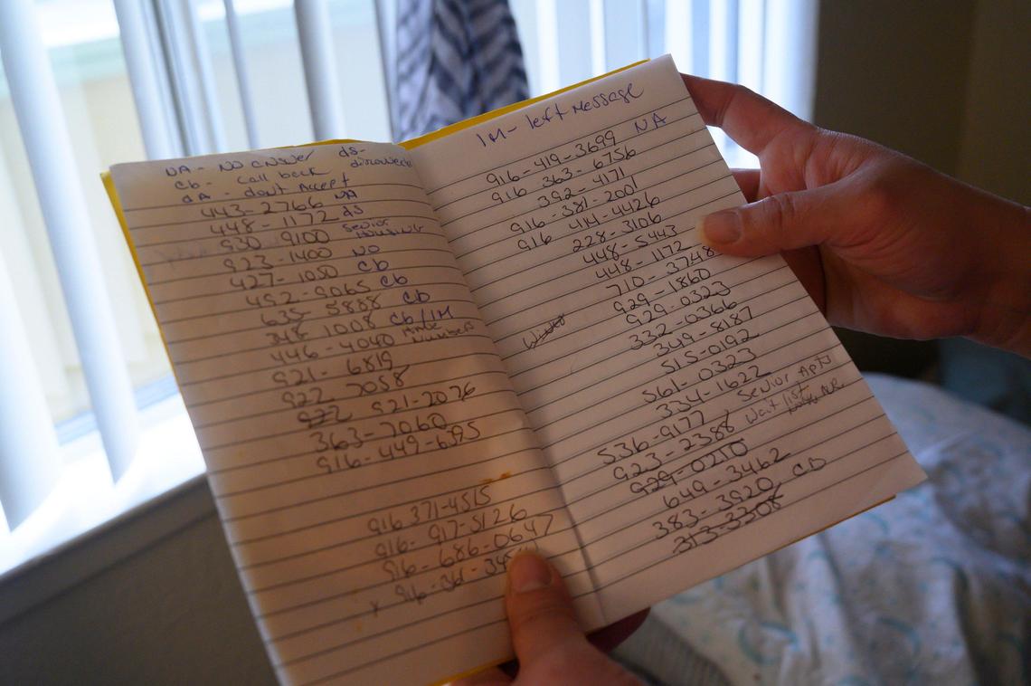 Carreen Huizar, 50, holds a list of numbers on Monday, Jan. 20, 2020, that she called to try and get housing with a Section 8 voucher while she was living in a transitional women’s home. “These are all low income apartments that say they accept it but see I wrote down ‘no answer, call back, don’t accept’ Believe it or not, all these people did not accept it or they didn’t have space,” said Huizar in her Sacramento apartment.