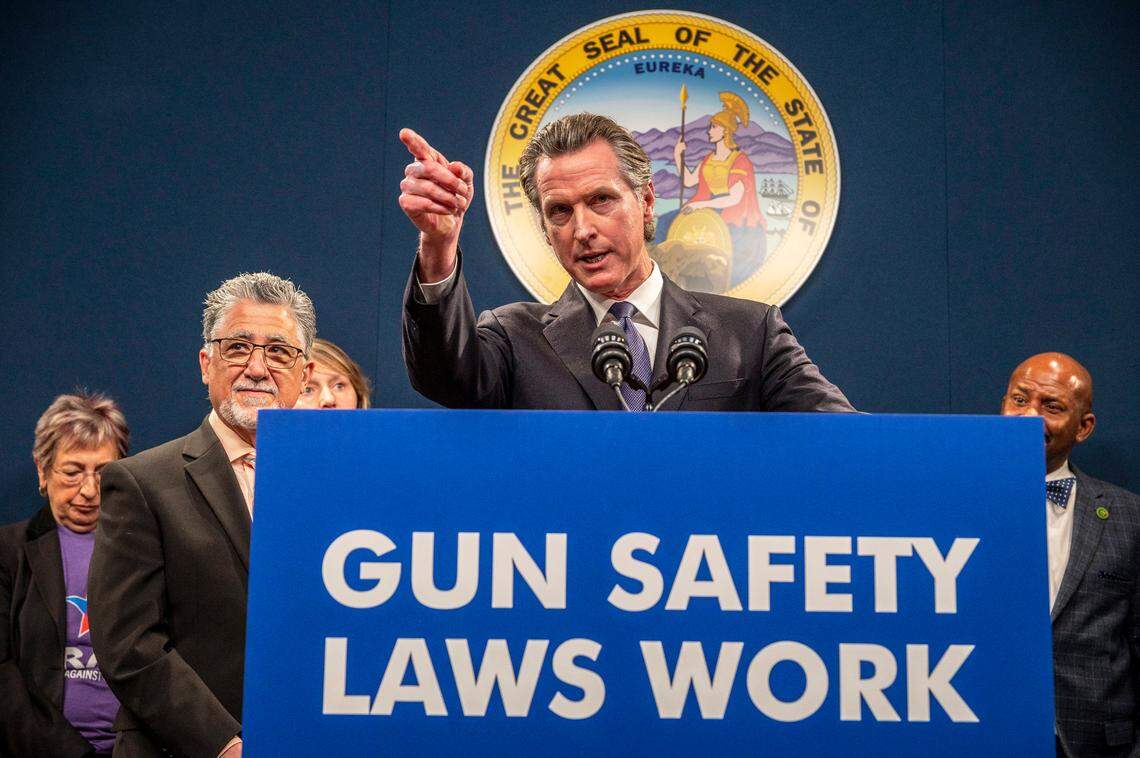 California Gov. Gavin Newsom answers questions at a press conference to push for the passing of Senate Bill 2 in Sacramento on Wednesday, Feb. 1, 2023. SB 2 would update the state’s concealed carry licensing process, add new age restrictions, impose strict gun storage and training mandates and limit where permit holders could carry firearms in public.
