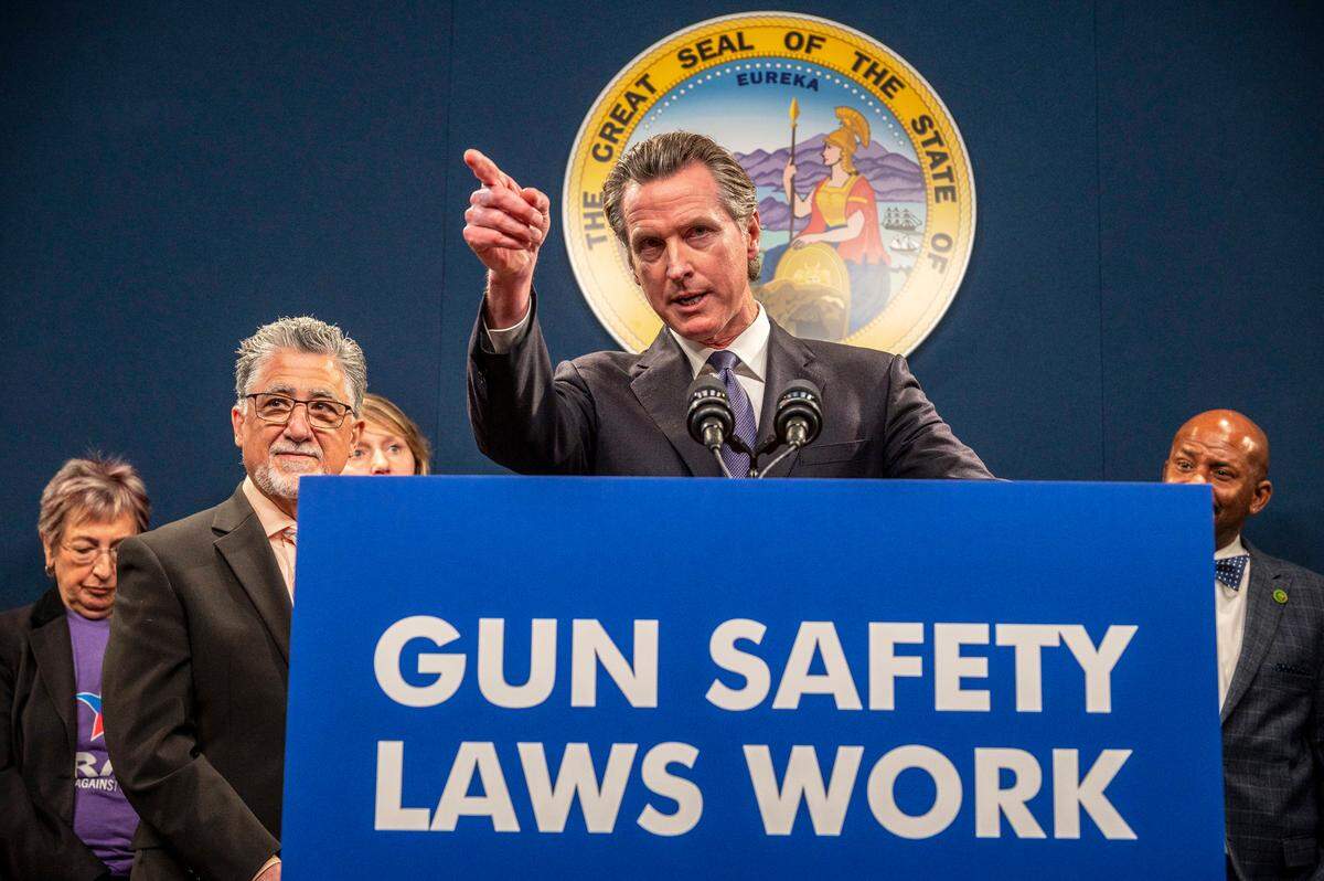 California Gov. Gavin Newsom answers questions at a press conference to push for the passing of Senate Bill 2 in Sacramento on Feb. 1. The bill would update the state’s concealed carry licensing process, add new age restrictions, impose strict gun storage and training mandates and limit where permit holders could carry firearms in public.