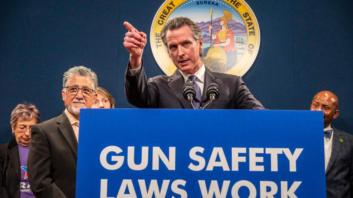California Gov. Gavin Newsom answers questions at a February press conference to push for passage of a bill update the state’s concealed carry licensing process, add new age restrictions, impose strict gun storage and training mandates and limit where permit holders could carry firearms in public.