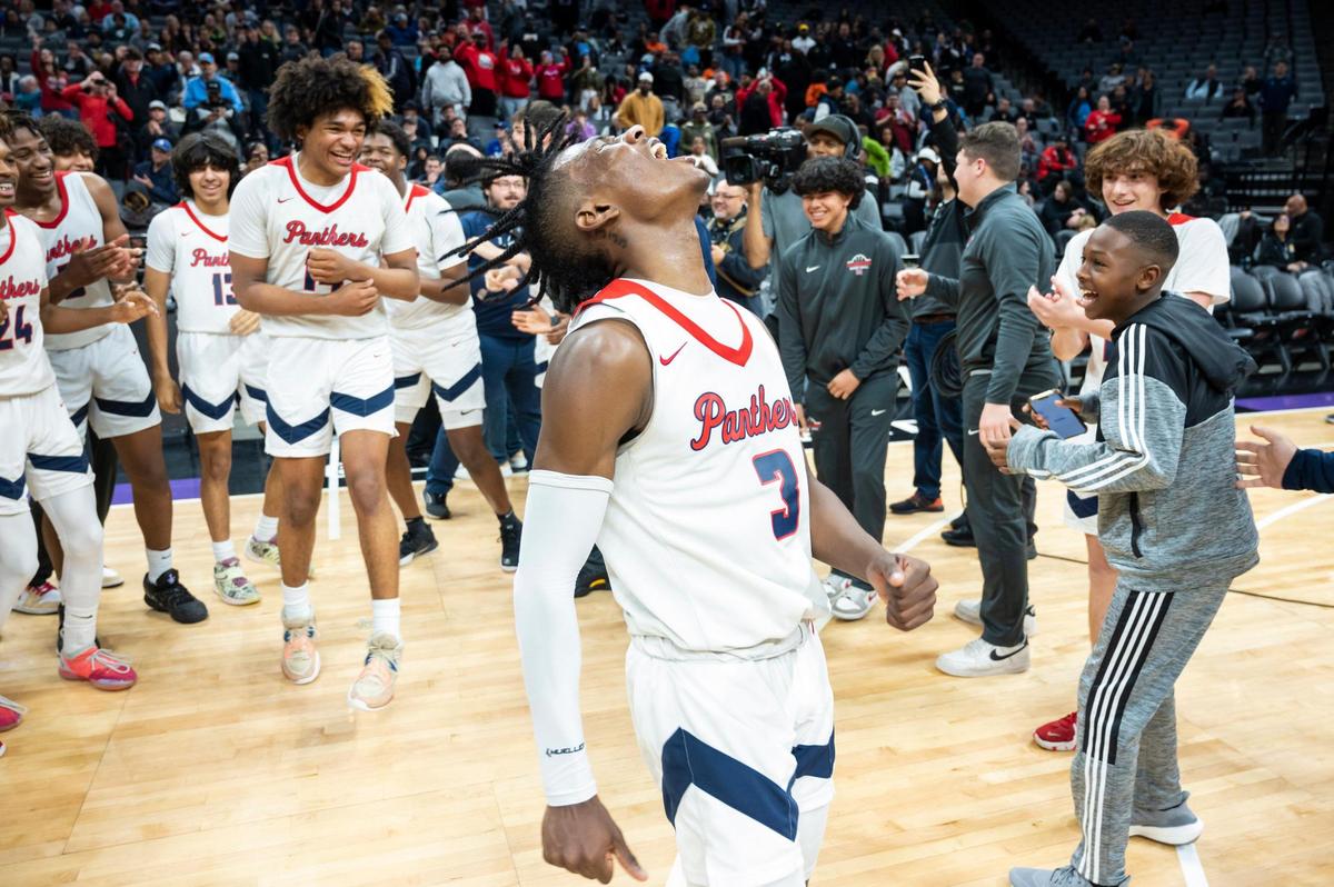 San Joaquin Memorial Panthers guard Armari Carraway (3) screams in celebration after winning the CIF State Division II Boys Basketball Championship against the Pacifica Christian Tritons on Saturday, March 11, 2023, at Golden 1 Center in Sacramento. Carraway had 13 points. The Panthers defeated the Tritons 58-47.