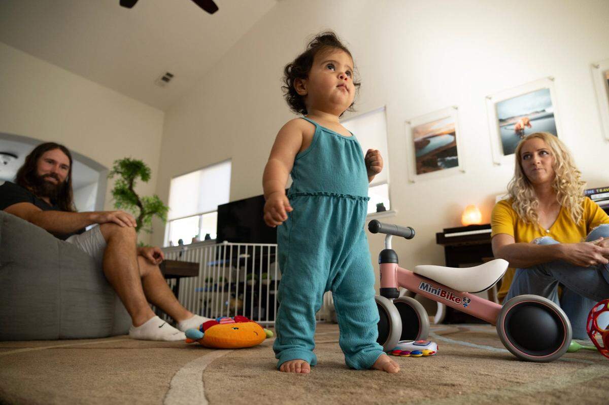 Sawyer Ingwell stands among her toys at home in Copperopolis in August. After ending their relationship with Little Angels Adoption, Adam and Jill Ingwell were matched with her a few weeks after they signed up with a new adoption agency.
