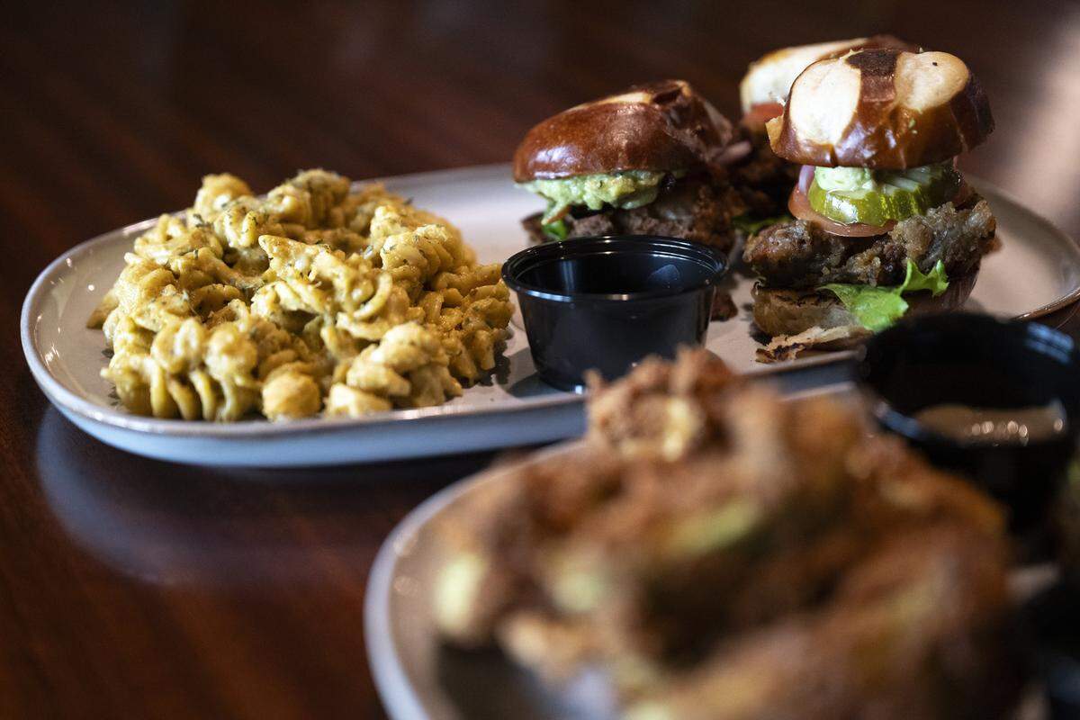 Elevated Eats’ oyster mushroom slider sampler and plant based mac and cheese at TAP Wine Lounge in Sacramento on Thursday, Dec. 4, 2025.