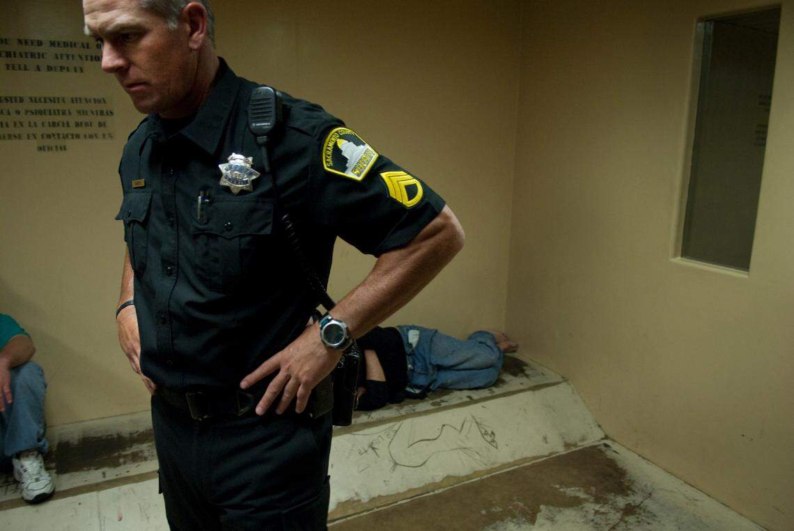 Sacramento County Sheriff’s Sgt. Greg Coauette checks on inmates inside the sobering cell at the Sacramento Main Jail on April 30, 2009. Inmates are placed in the “drunk tank” until they are sober enough to be released or transferred to a different area of the jail.