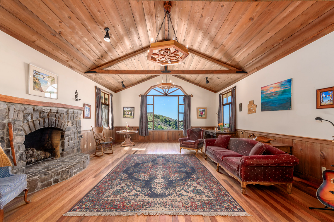 The property features a large country home, barn, workshop, huge pond for swimming and fishing and an air strip. Western views of the ocean are spectacular, too.