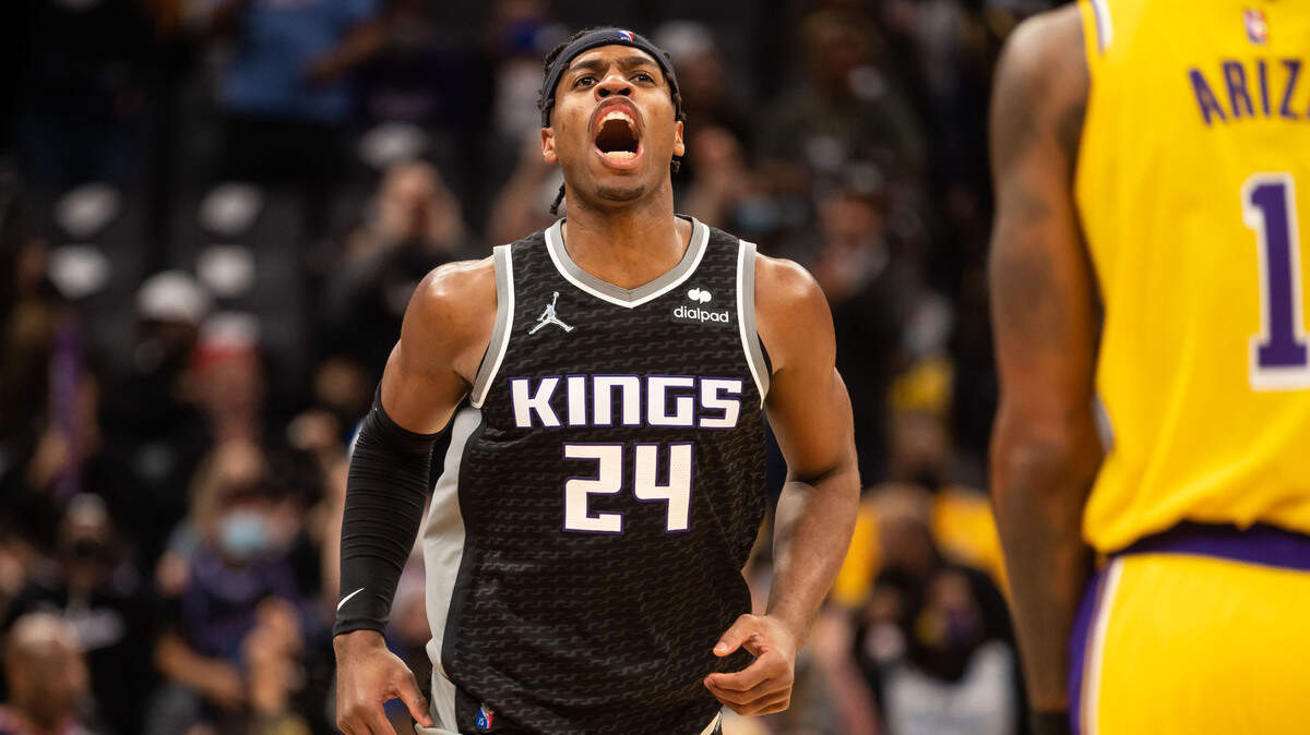 Sacramento Kings guard Buddy Hield (24) celebrates sinking a three pointer on a Kings run against the Los Angeles Lakers during the third period of the NBA basketball game Wednesday, Jan. 12, 2022, at Golden 1 Center in Sacramento.