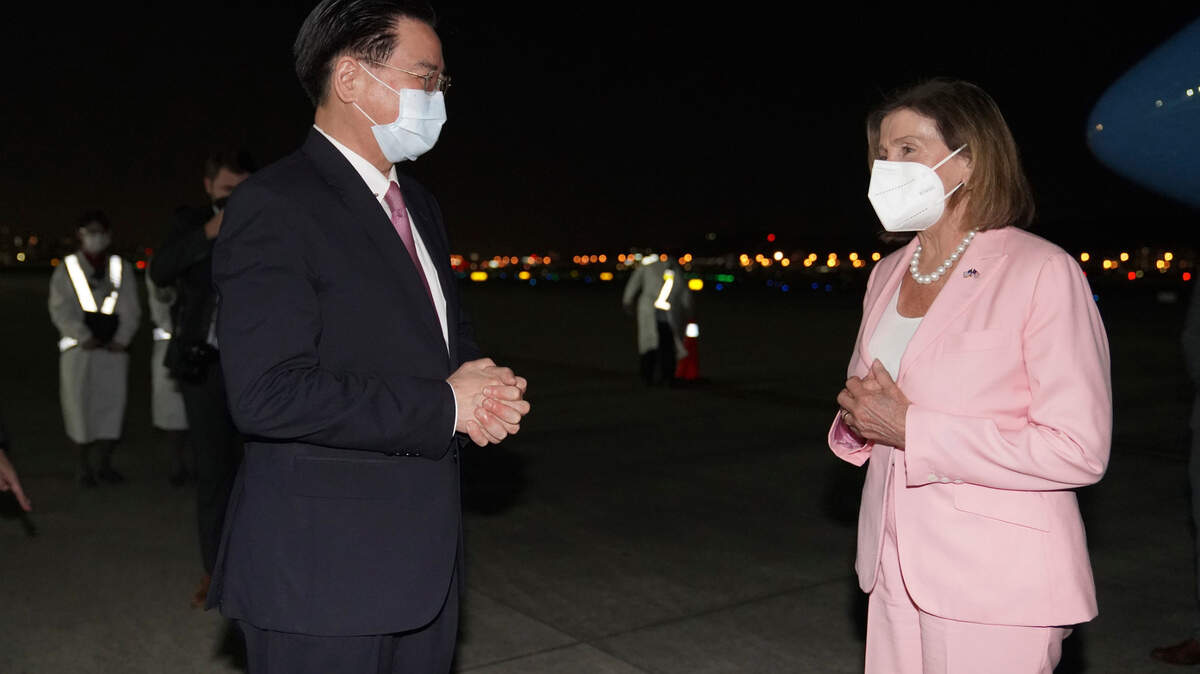 In this photo released by the Taiwan Ministry of Foreign Affairs, U.S. House Speaker Nancy Pelosi, right is greeted by Taiwan’s Foreign Minister Joseph Wu as she arrives in Taipei, Taiwan, Tuesday, Aug. 2, 2022. Pelosi arrived in Taiwan on Tuesday night despite threats from Beijing of serious consequences, becoming the highest-ranking American official to visit the self-ruled island claimed by China in 25 years.