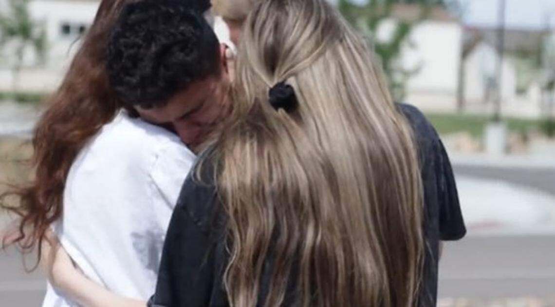 Friends of two Colorado teens killed in a head-on collision days before starting their senior year at high school comfort each other.