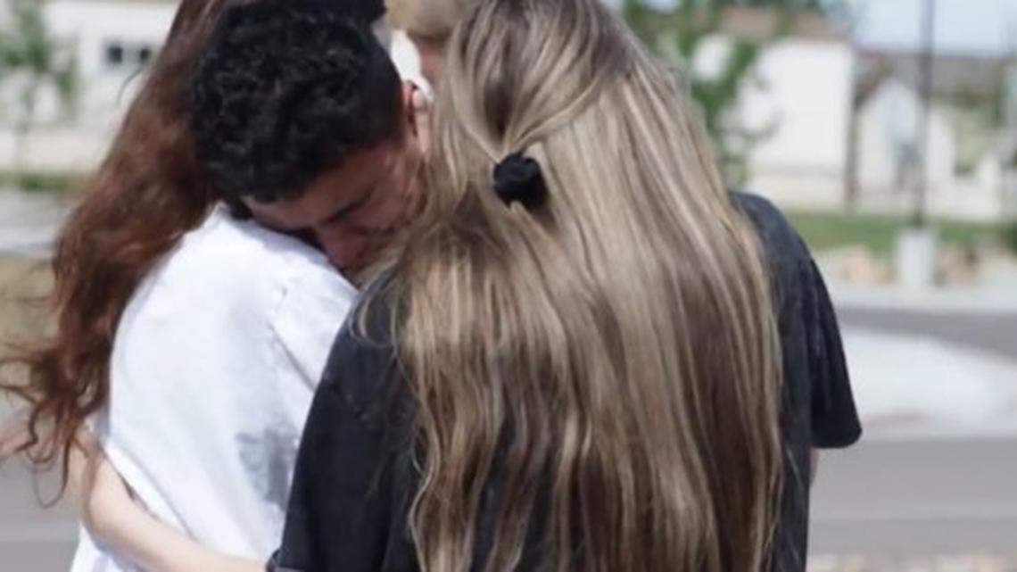 Friends of two Colorado teens killed in a head-on collision days before starting their senior year at high school comfort each other.
