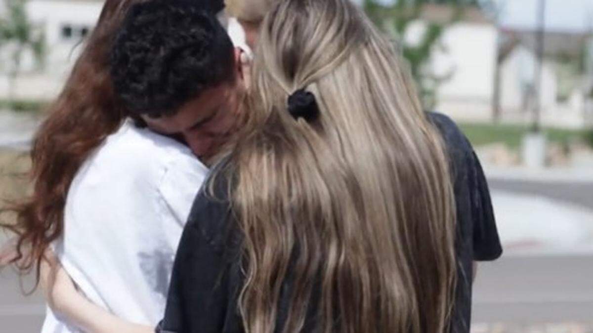 Friends of two Colorado teens killed in a head-on collision days before starting their senior year at high school comfort each other.