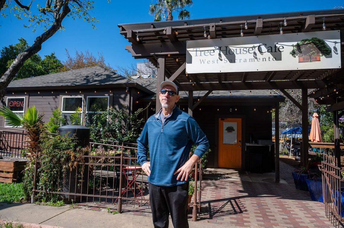 Owner Jeff “Fro” Davis stands at Tree House Cafe in West Sacramento, about a quarter-mile from Sutter Health Park, earlier this month. A liquor license and a new bar are some of the upgrades inspired by the A’s arrival.