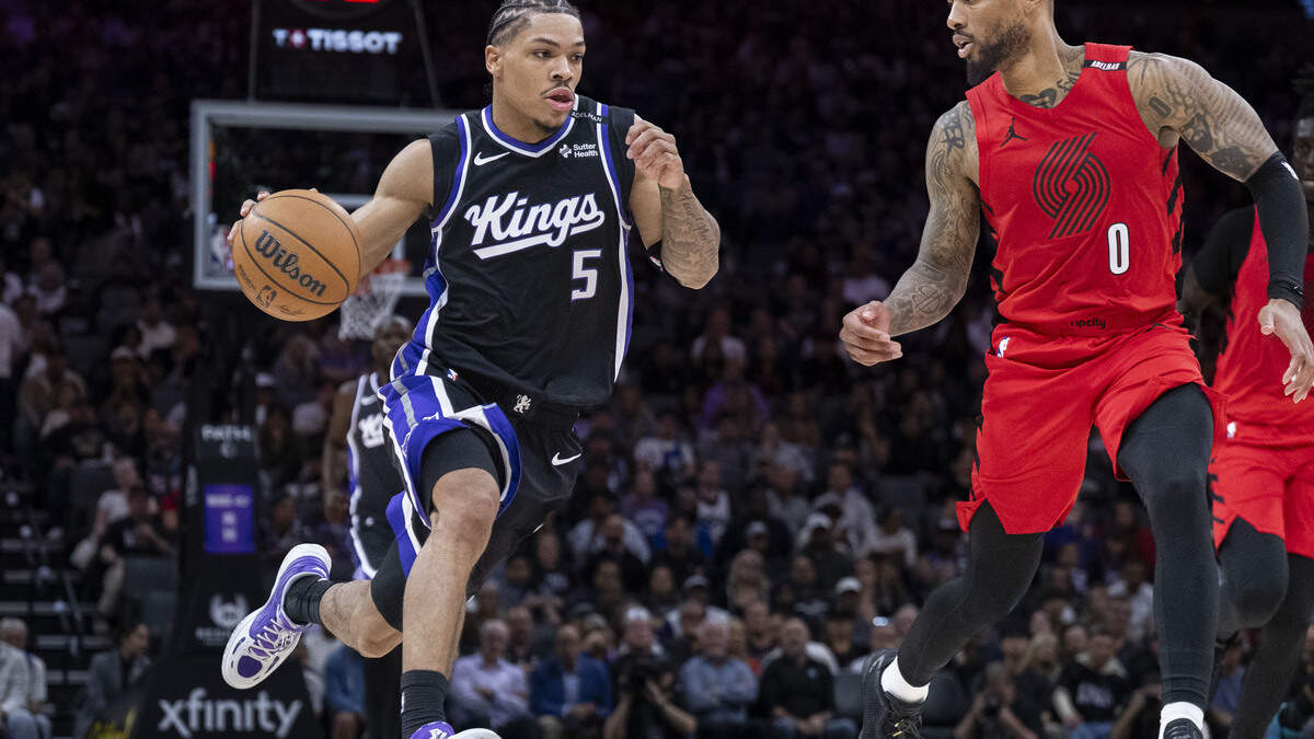 See a photo gallery of the Sacramento Kings loss against the Portland Trail Blazers
