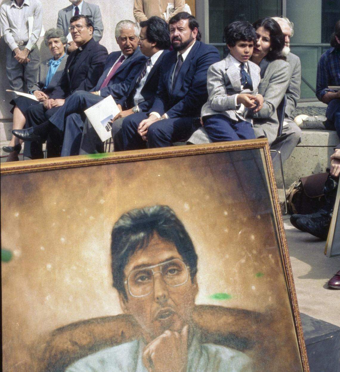 A painting of the late Sacramento Municipal Court Judge Lorenzo Patino brought his presence to ceremonies Monday, March 6, 1989, as a sign with his name was unveiled at the county’s recent dedicated new main jail, the Lorenzo E. Patino Hall of Justice. Nelly Patino and Lorenzo Jr., 7, the widow and son of the late judge, who died of leukemia in 1983, are seated at right.