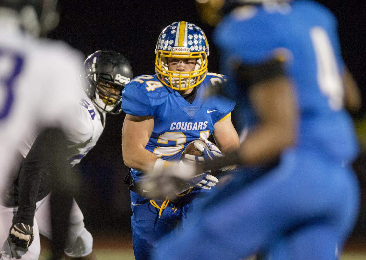 Del Campo’s Levi Markey looks for running room against Sacramento in a Sac-Joaquin Section football playoff second-round game in Carmichael on Nov. 16, 2017.