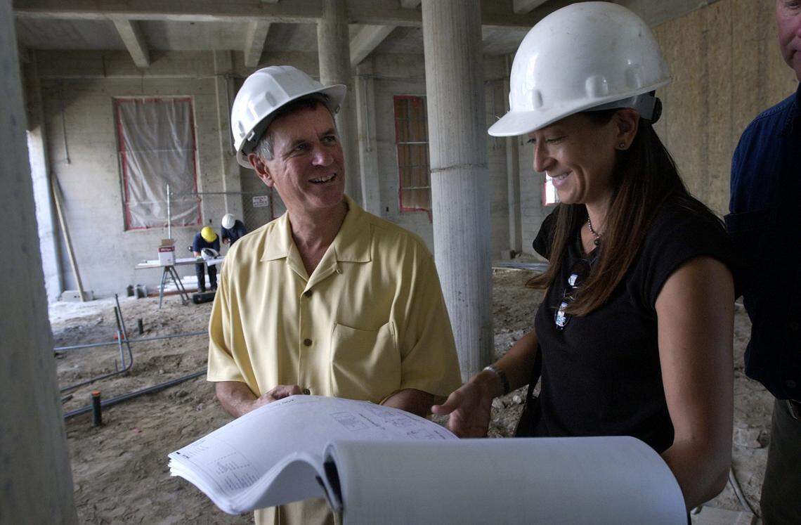 Restauranteur Randy Paragary talks with project architect Sharon Okada on Wednesday, Sept. 10, 2003, while looking over site plans of a 25,000 square foot complex in a renovated warehouse at the corner of 15th and R Streets that will have 10,000 square-foot nightclub, a restaurant and a third-floor art gallery.