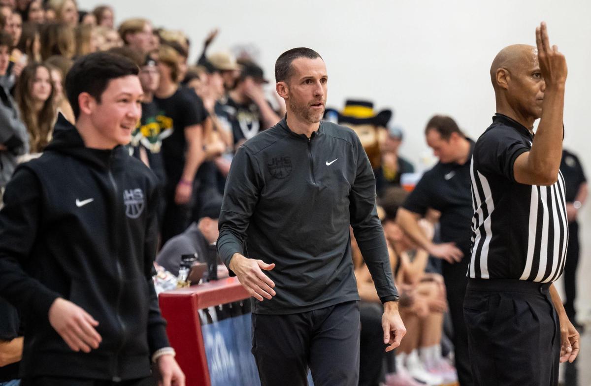 Jesuit Marauder head coach Tim Kelly watches his team on offense as they play Rio Americano during the third quarter of the high school boys basketball game Friday, Dec. 16, 2022, at Jesuit High School in Carmichael.
