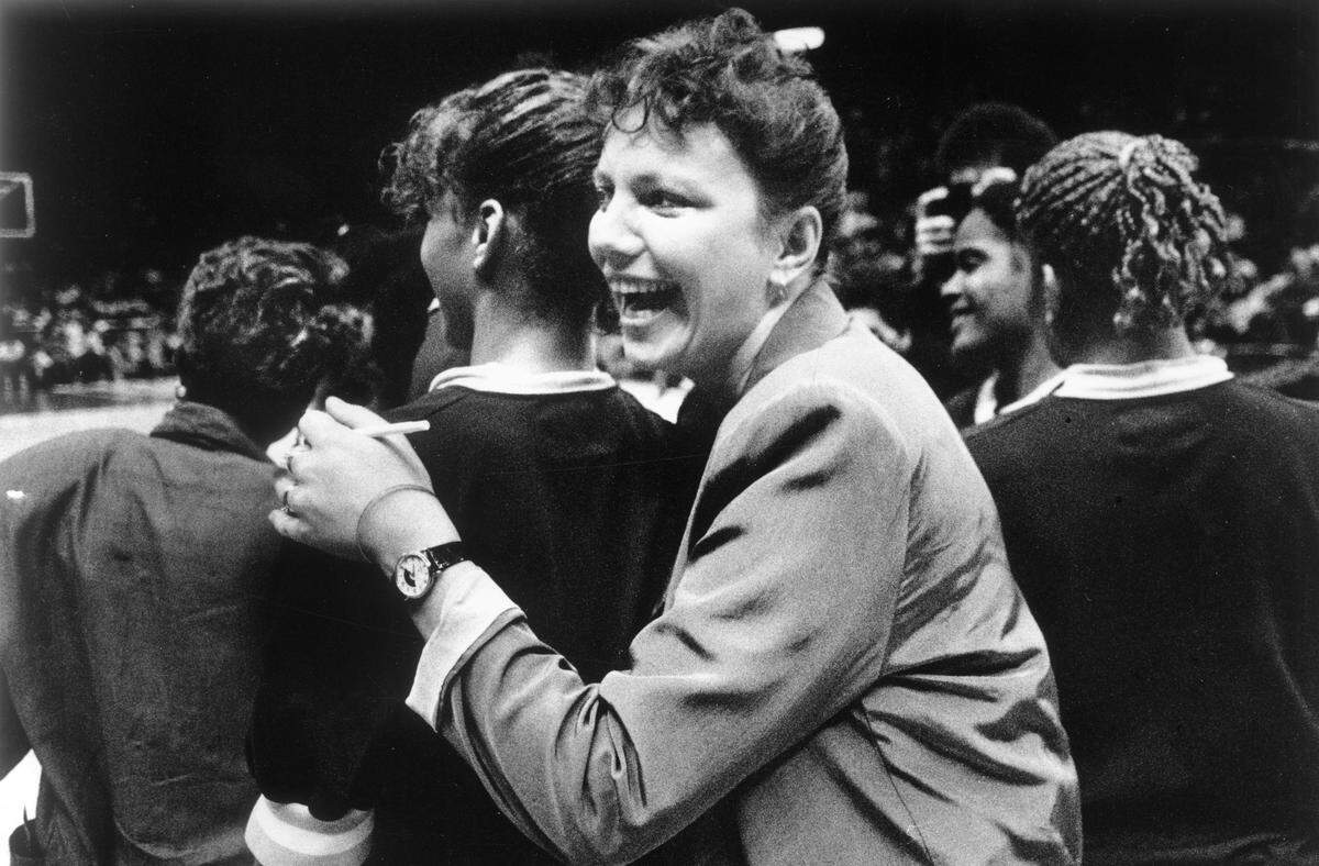 Connie Zuercher is all smiles after leading the Grant High School girls to their second consecutive CIF State Division II championship at Oakland Coliseum Arena in 1989. Zuercher's team beat Katella of Anaheim 59-43 for the title.