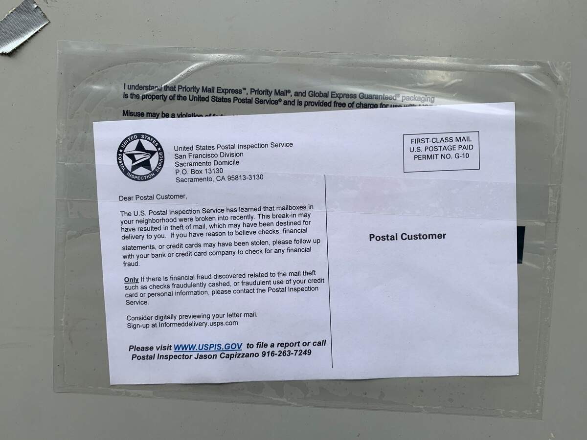 A letter posted to a mailbox unit in the Woodside condo complex in Arden Arcade.