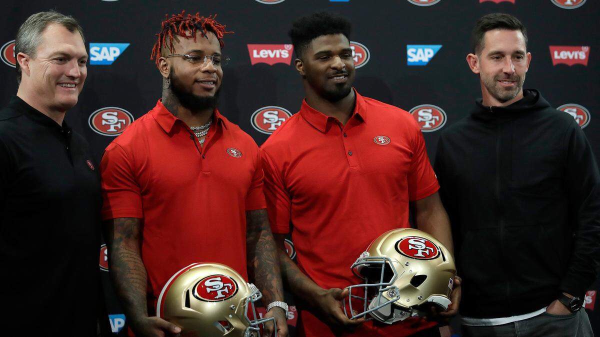 From left, San Francisco 49ers General Manager John Lynch, Kwon Alexander, Dee Ford and coach Kyle Shanahan stand for a photo following an NFL news conference Thursday, March 14, 2019, in Santa Clara, Calif. (AP Photo/Ben Margot)