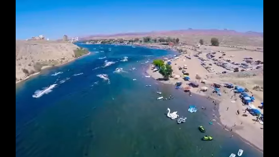 A teenager died after being thrown from an inflatable raft on a river and becoming trapped underneath, Arizona police said. 