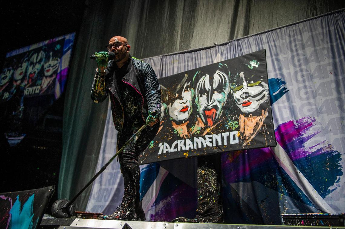 Performance artist David Garibaldi opens for the band Kiss at Golden 1 Center on Saturday, Feb. 9, 2019. Garibaldi paints three art pieces during the opener that will be auctioned off to benefit 916 Ink, a local arts-based creative writing nonprofit organization.