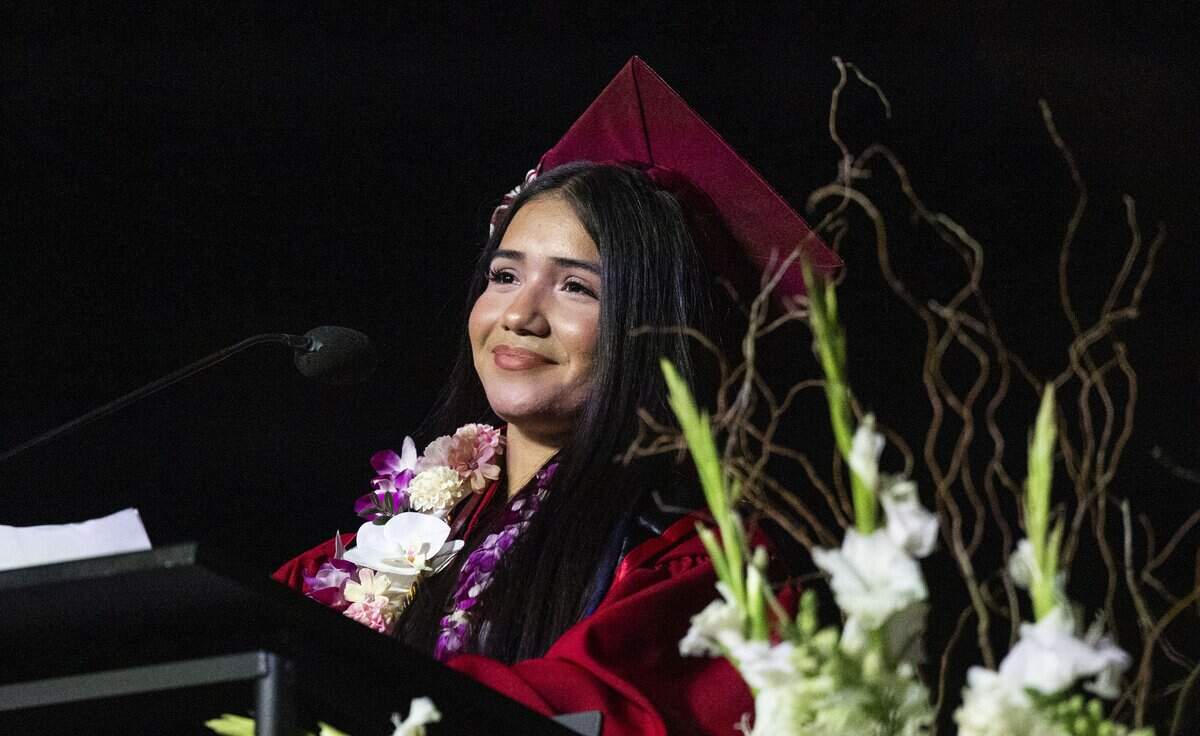 Greybis Lopez Guandique, a commencement speaker and graduate, invites her parents to stand as she thanks them for their support at C.K. McClatchy High School’s graduation ceremony at Golden 1 Center on Monday, June 8, 2026.