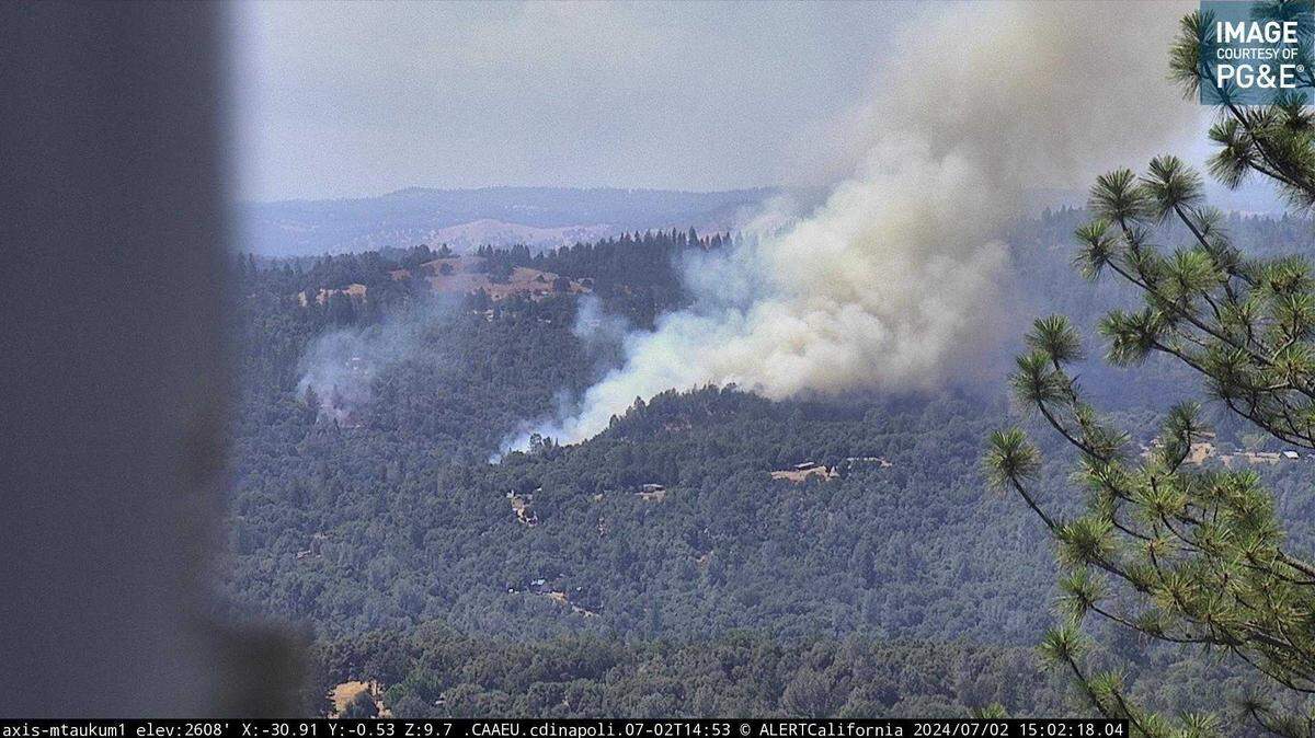The Moccasin Fire burns Tuesday in El Dorado County after a fire broke out near Oak Hill Road.