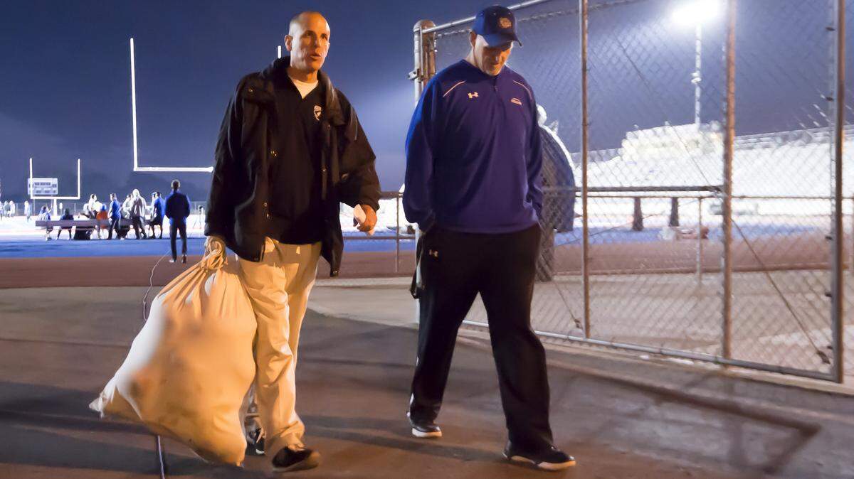 Sheldon football coach Joe Cattolico, left, walks with Kris Richardson, then the coach at Folsom, before a Sac-Joaquin Section Division I playoff game Nov. 18, 2016. Cattolico is stepping down to spend more time with his family. Richardson is now coaching at Sacramento State.