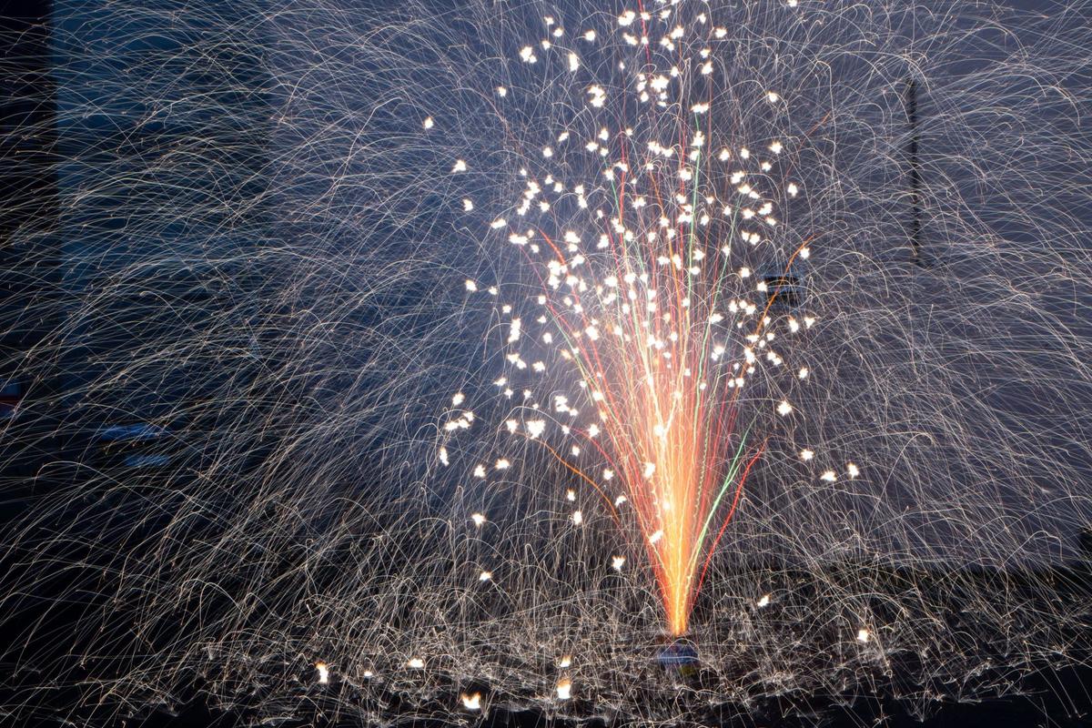 TNT Fireworks’ Living the Dream fountain showers out fiery bands of color and light.