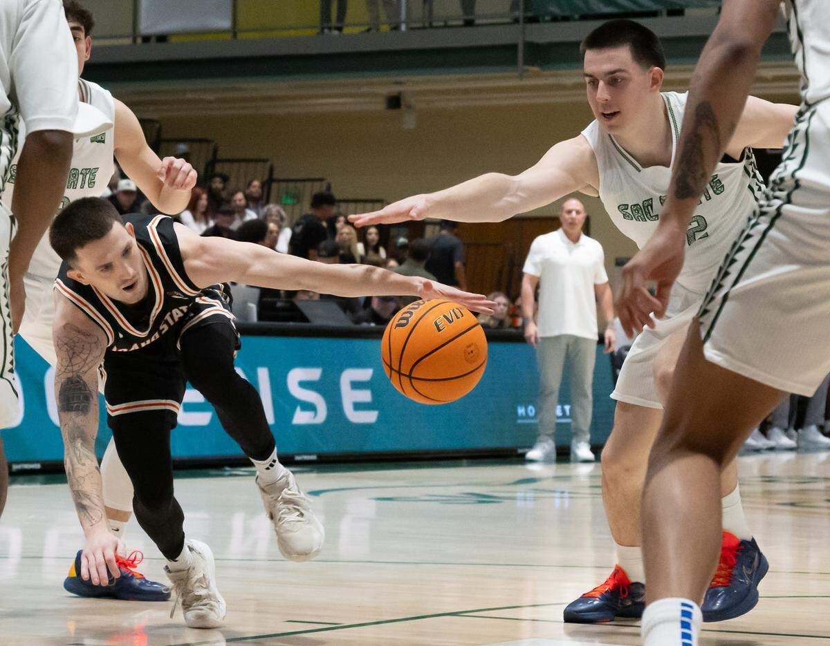 Sacramento State Hornets forward Mark Lavrenov steals the ball from Idaho State Bengals guard Gus Etchison during a game at Sacramento State on Monday, March 2.