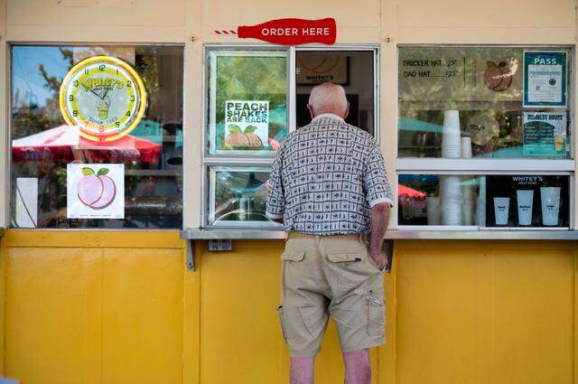 A customer orders at Whitey’s Jolly Kone in West Sacramento on Tuesday.
